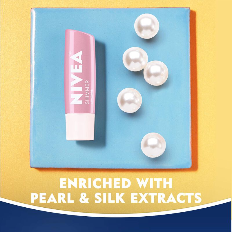 B&aacute;lsamo Labial Nivea Shimmer Con Manteca De Kar... image number null
