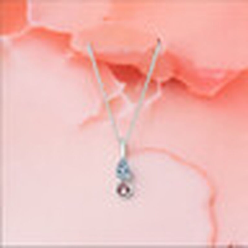 Dije Iris de plata .925 con topacio y turmalina... image number null