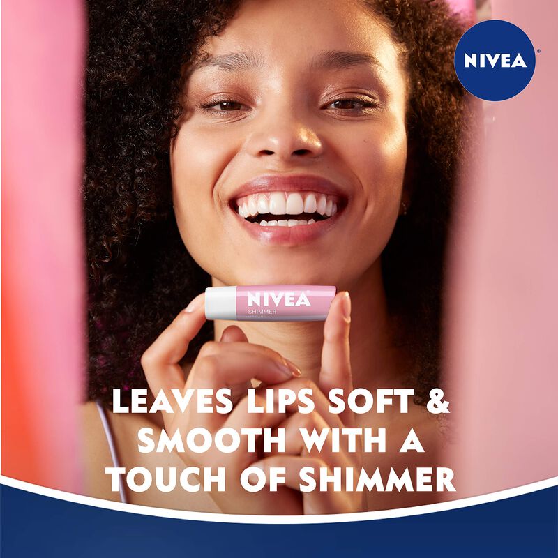 B&aacute;lsamo Labial Nivea Shimmer Con Manteca De Kar... image number null