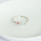 Anillo Iris de plata .925 con topacio y rodolita