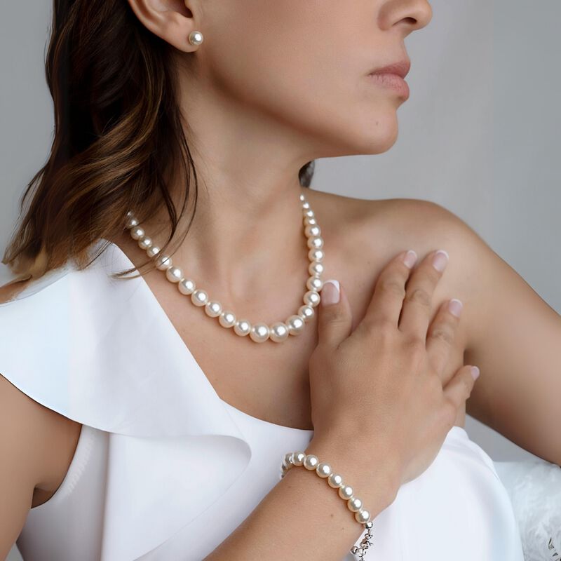 Collar aretes y pulsera Perlas de cristal creci... image number null