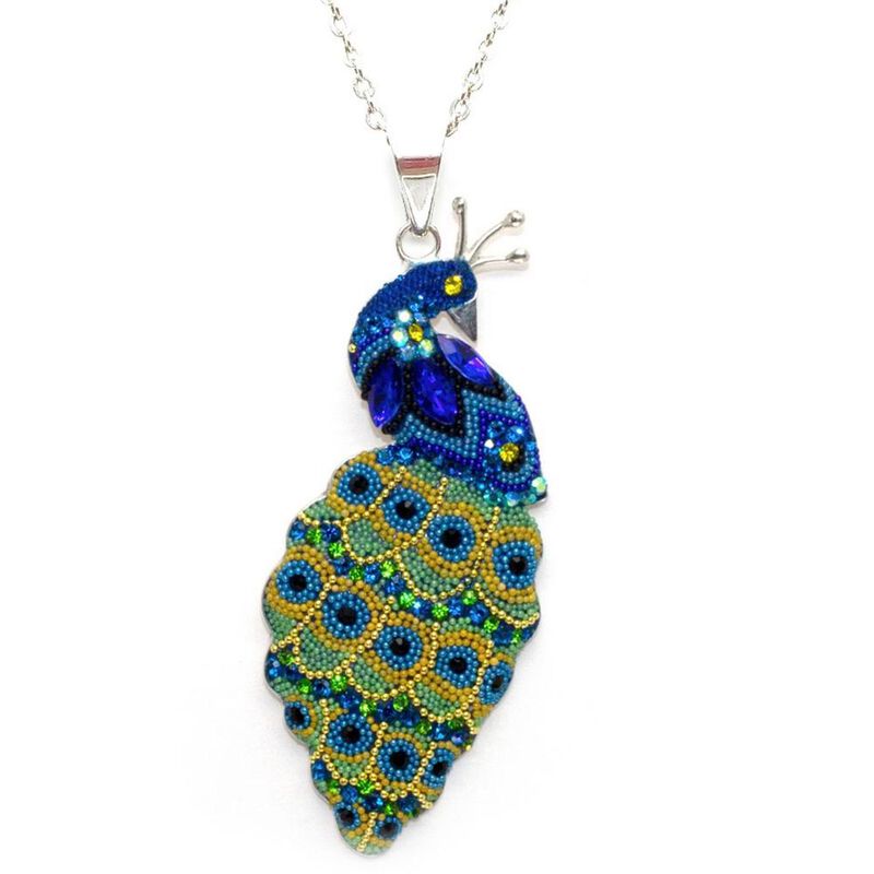 Set Collar y Aretes Pavorreal Zvezda 0.925 Muje... image number null