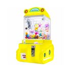 Maquina Garra Peluches Amarilla Mini Doll Caza Luz Led Sonido Tankman Audiotek