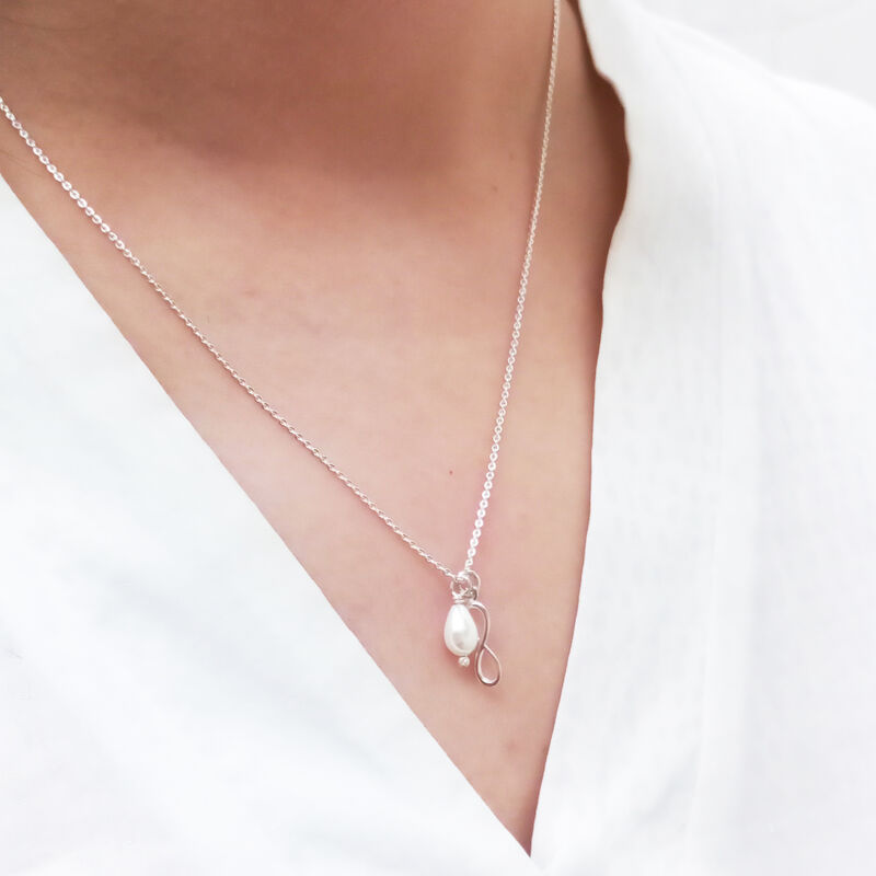 Dije infinito de plata con perla y cadena image number null