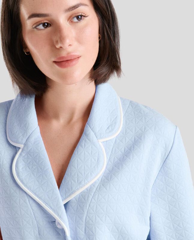 Bata Abotonada con Vivo Celeste image number null