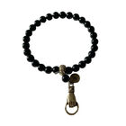 Pulsera Negra De &Aacute;gatas Con Dije Met&aacute;lico De Mano Luma